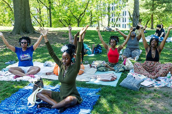 Attendees connect at the Soft Reset event in Brooklyn with Sound Off wireless headphones