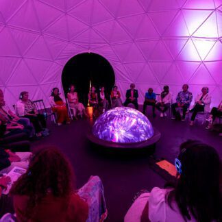 Participants experiencing the Lumisphere with Sound Off slient disco headphones